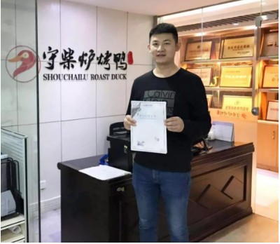 烤鸭加盟商留影